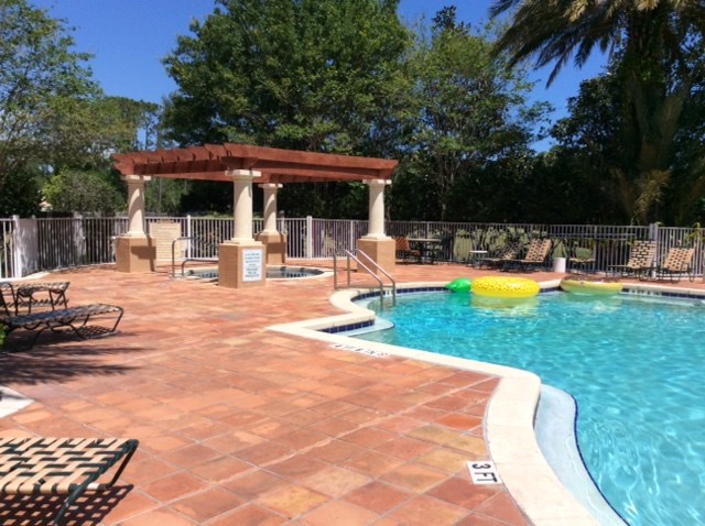 520 Florida Club Boulevard, Unit 103 St. Augustine, FL 32084 - Photo 23 of 26 a view of a house with swimming pool and sitting area