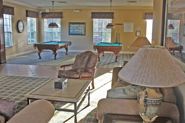 a view of a back yard with flower garden