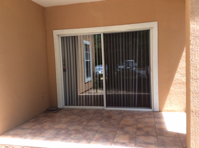 520 Florida Club Boulevard, Unit 103 St. Augustine, FL 32084 - Photo 5 of 26 a view of outdoor space with wooden wall