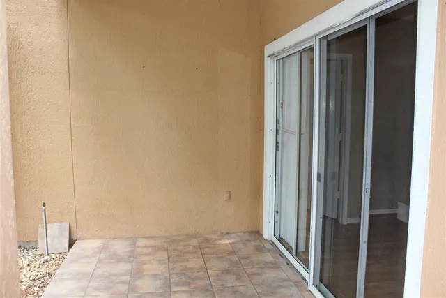 a view of cabinets with wooden floor