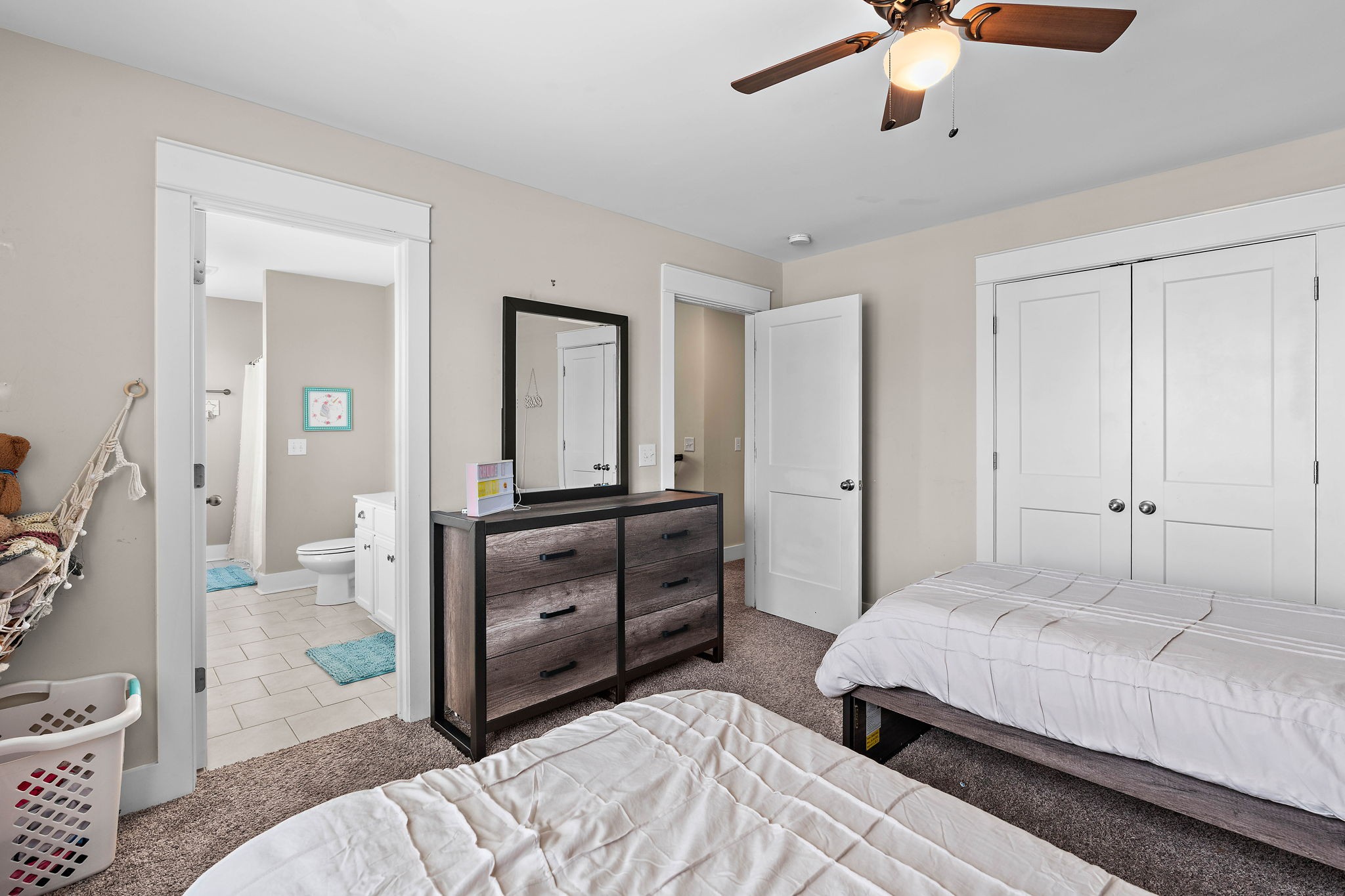 1327 Batbriar Road Murfreesboro, TN 37128 - Photo 20 of 33 a bedroom with a bed and a chandelier