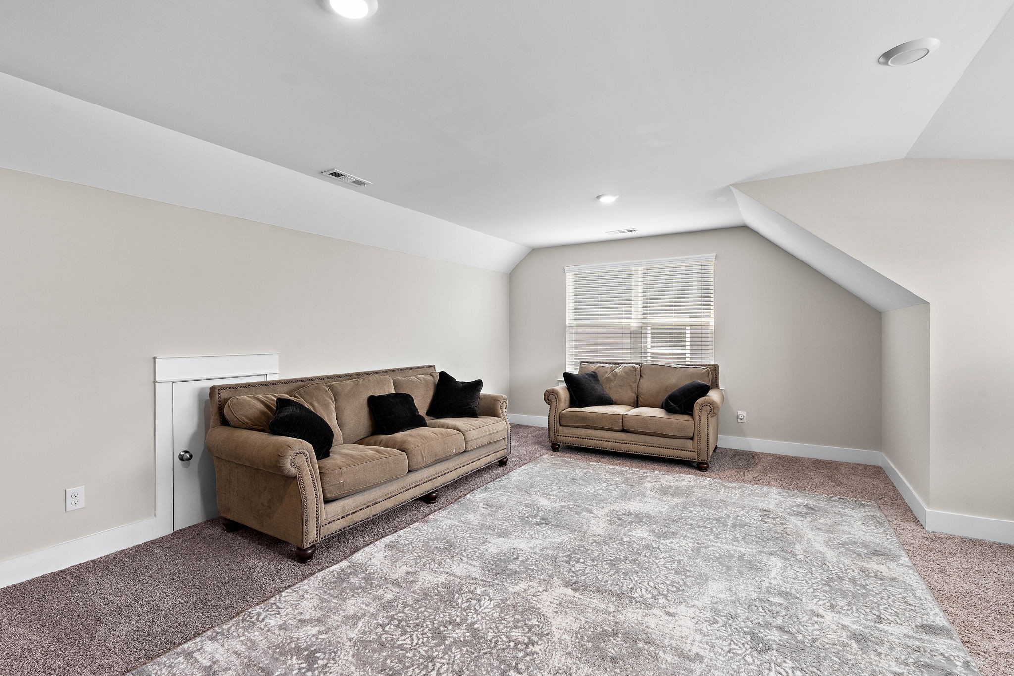 1327 Batbriar Road Murfreesboro, TN 37128 - Photo 27 of 33 a living room with furniture and a couch