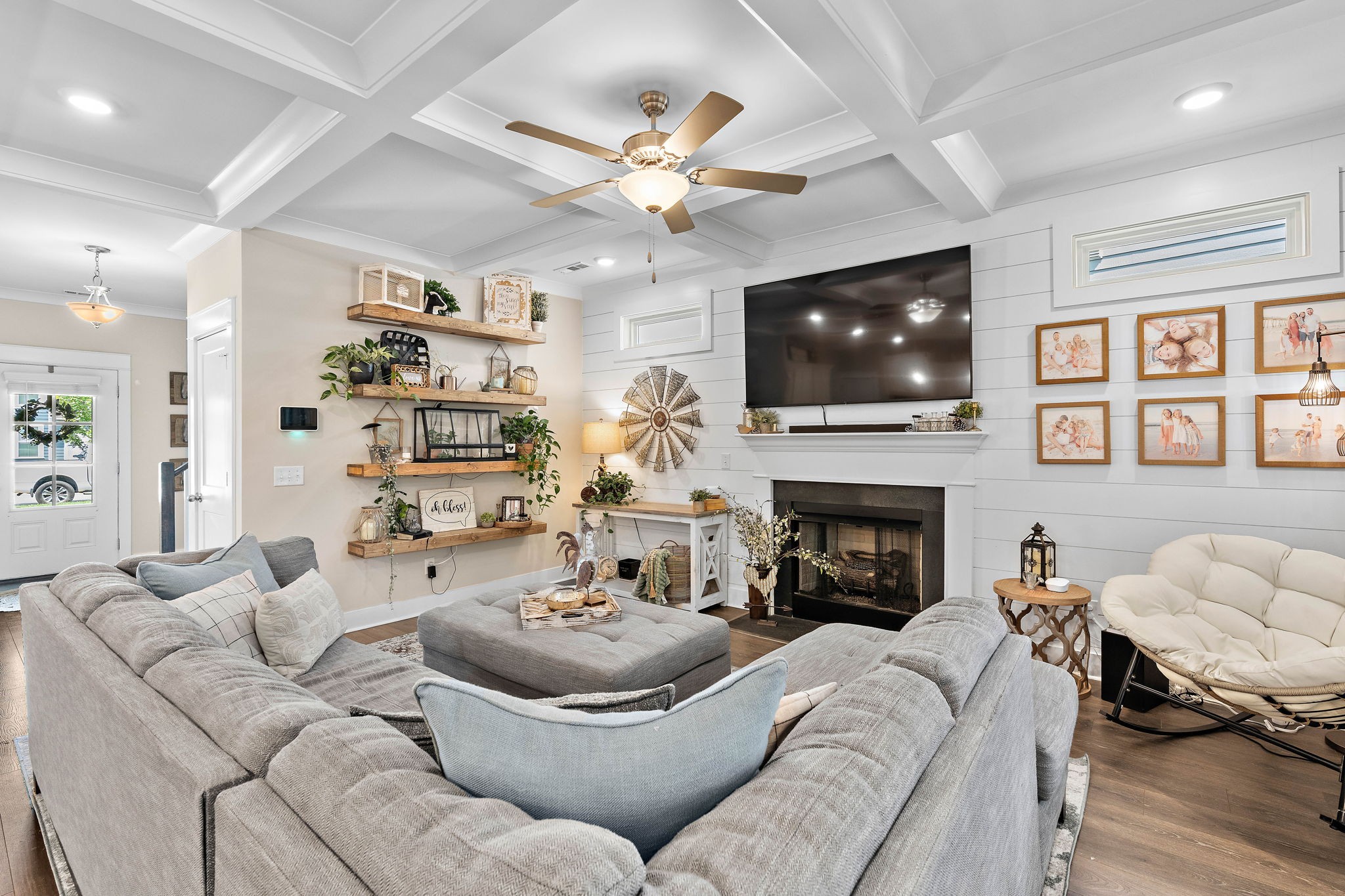 1327 Batbriar Road Murfreesboro, TN 37128 - Photo 6 of 33 a living room with furniture a fireplace and a flat screen tv