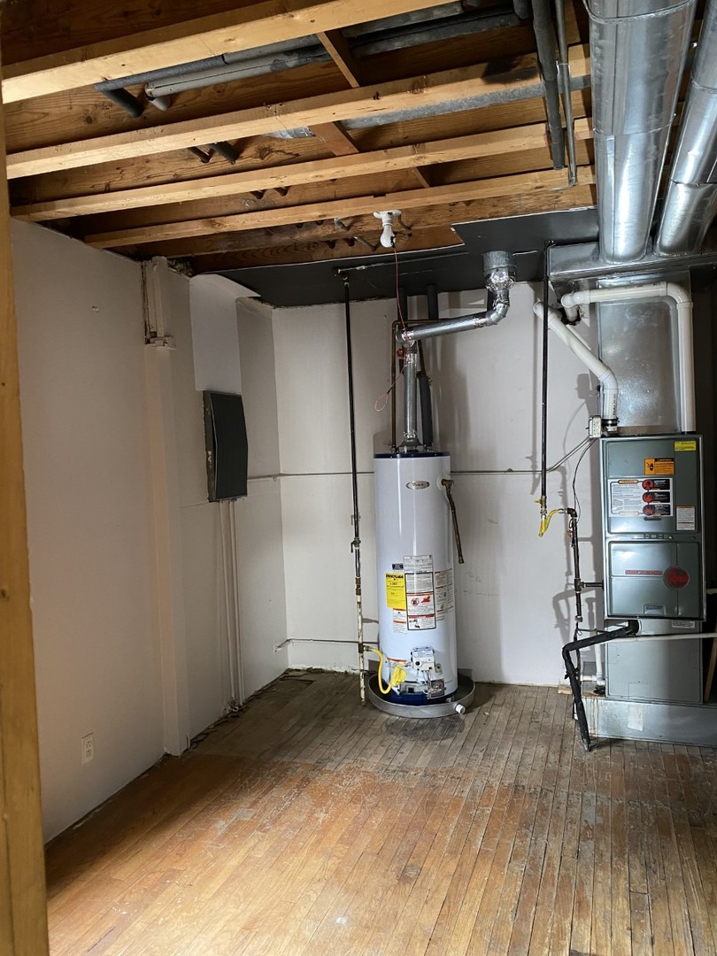 242 Highland Road Willowbrook, IL 60527 - Photo 13 of 24 a view of storage and utility room