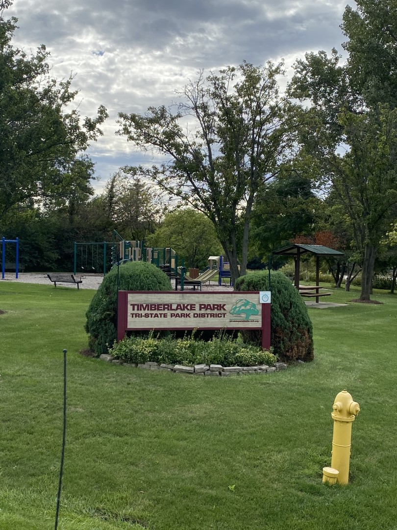 242 Highland Road Willowbrook, IL 60527 - Photo 24 of 24 a view of a park with large trees