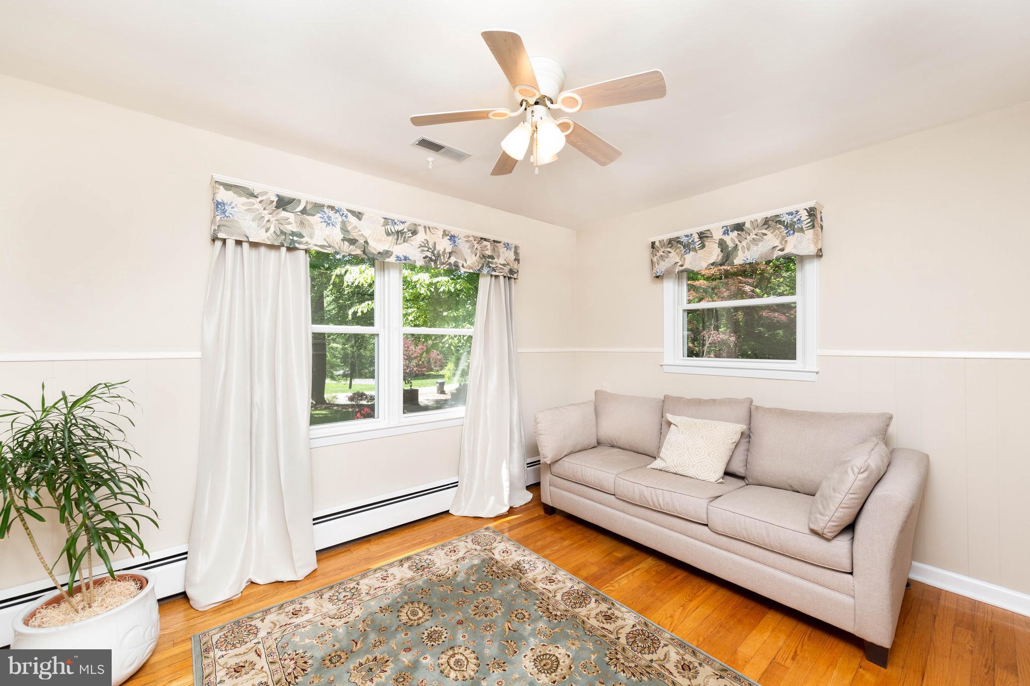 413 Whitaker Mill Road Fallston, MD 21047 - Photo 20 of 28 a living room with furniture and a large window