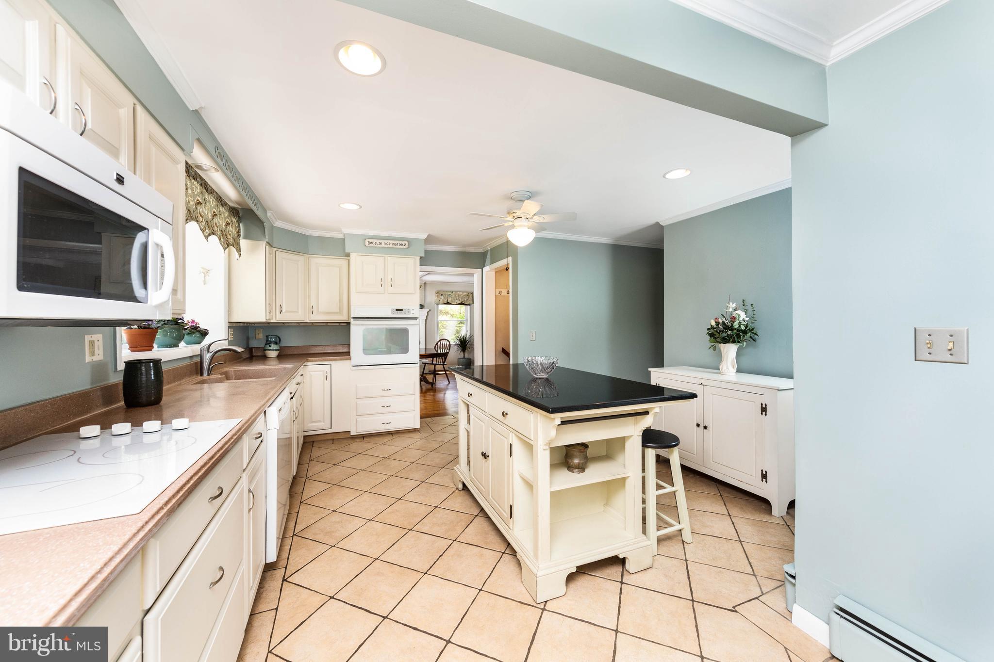 413 Whitaker Mill Road Fallston, MD 21047 - Photo 10 of 28 a kitchen with a sink stainless steel appliances and cabinets