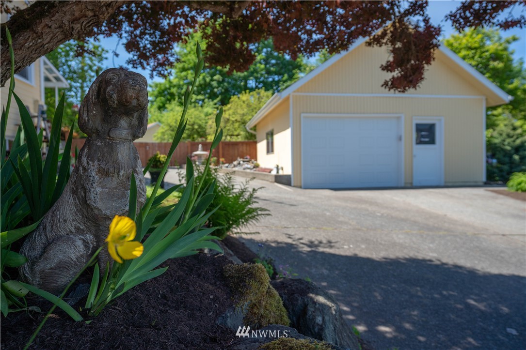 23908 24th Drive Southeast Bothell, WA 98021 - Photo 2 of 40 a front view of a house with yard and trees