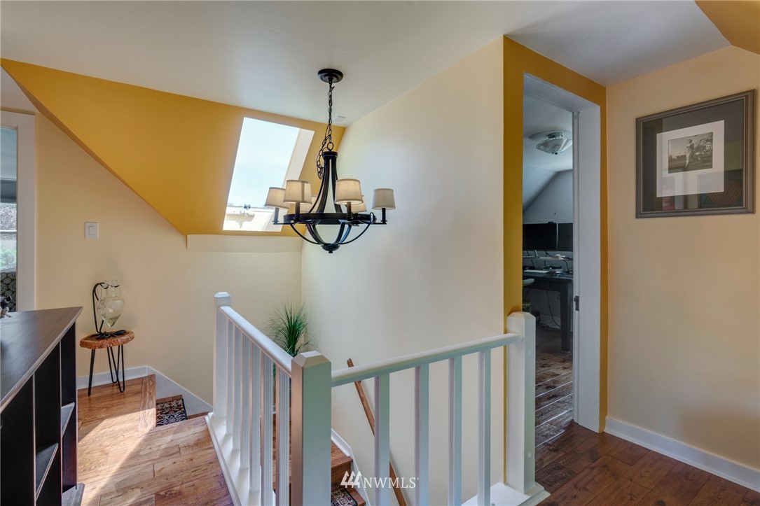 23908 24th Drive Southeast Bothell, WA 98021 - Photo 27 of 40 a view of hallway with stairs and wooden floor