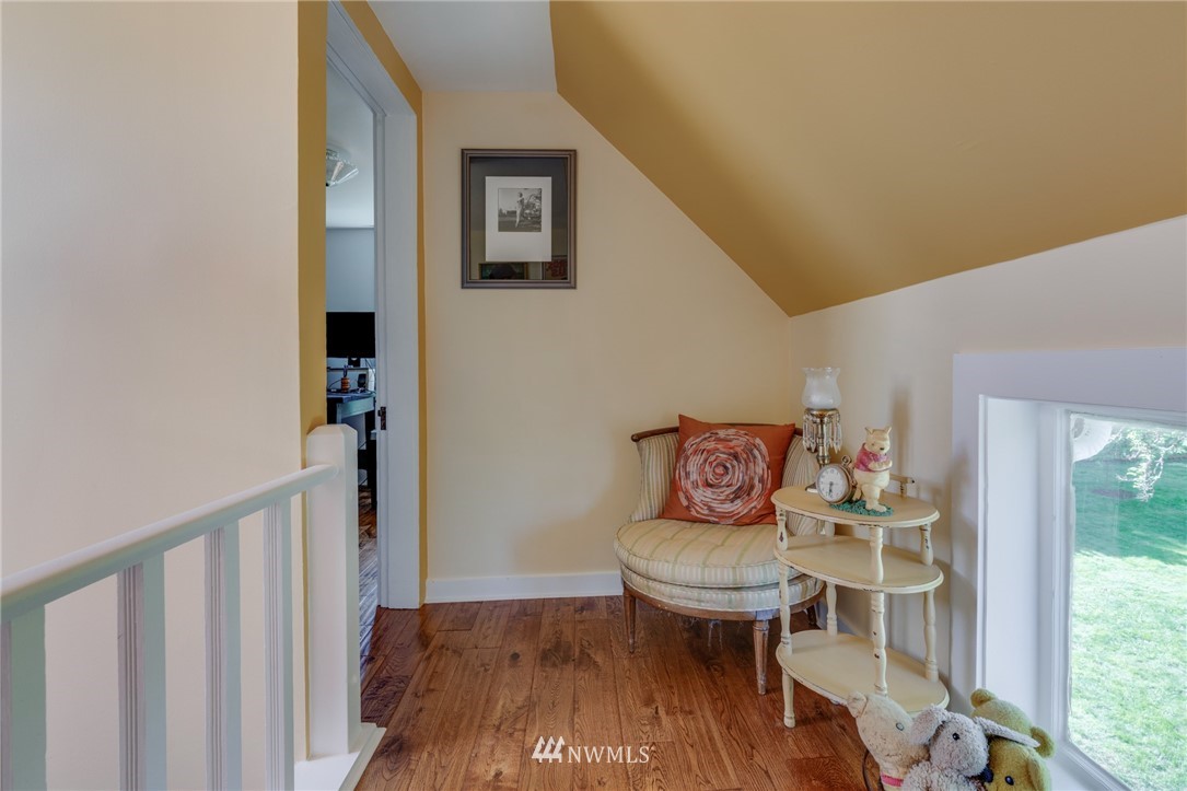 23908 24th Drive Southeast Bothell, WA 98021 - Photo 28 of 40 a view of a dining room with furniture window and wooden floor