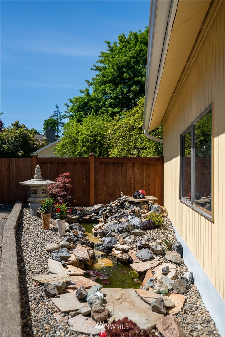 23908 24th Drive Southeast Bothell, WA 98021 - Photo 35 of 40 a view of a backyard with wooden fence