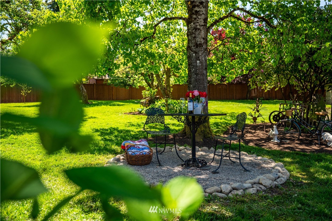 23908 24th Drive Southeast Bothell, WA 98021 - Photo 39 of 40 a backyard of a house with a yard and outdoor seating
