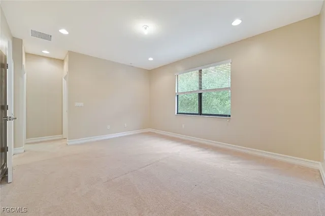 an empty room with a window