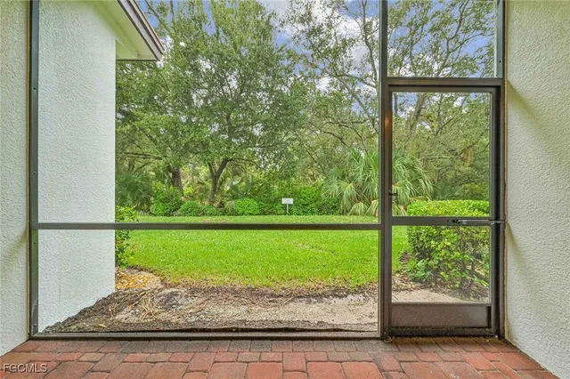 a view of a porch with a yard