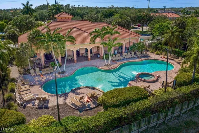 a view of a garden with a swimming pool
