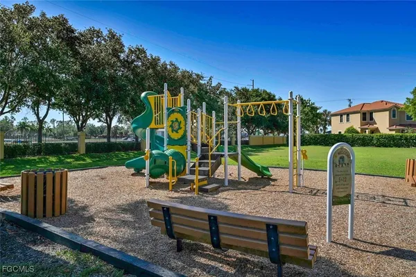 a view of a park with swings