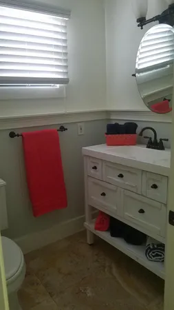 a room with a bed and a window