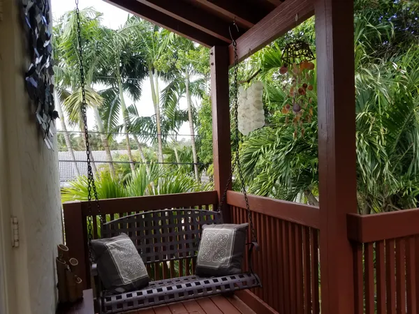 a view of a two chairs in the deck