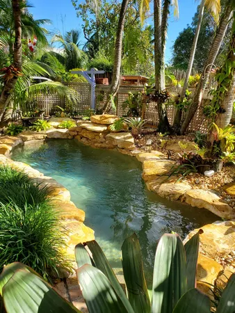 a potted plant sitting in front of a house