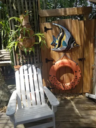 a view of a house with a tree