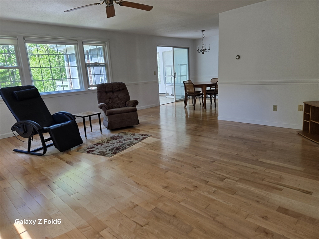 222 Buck Island Road, Unit 45 Yarmouth, MA 02673 - Photo 4 of 23 a living room with furniture and a window