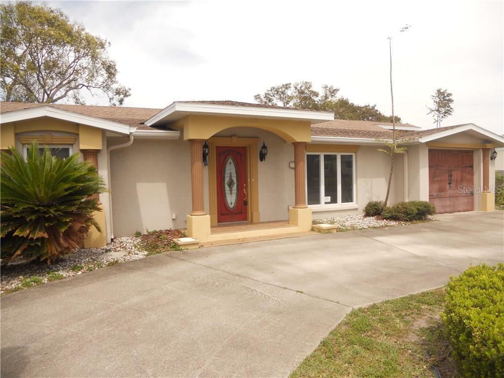 3101 Homasassa Road Sarasota, FL 34239 - Photo 1 of 1 Front Elevation, circle drive