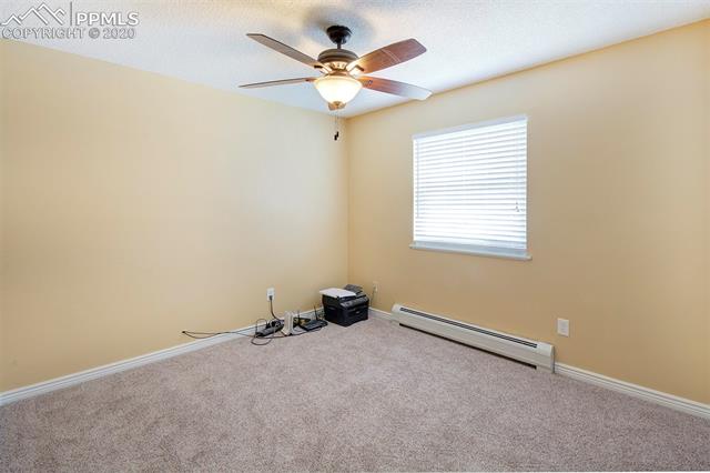 17879 Pinon Park Road Peyton, CO 80831 - Photo 18 of 26 Main level bedroom 2.
