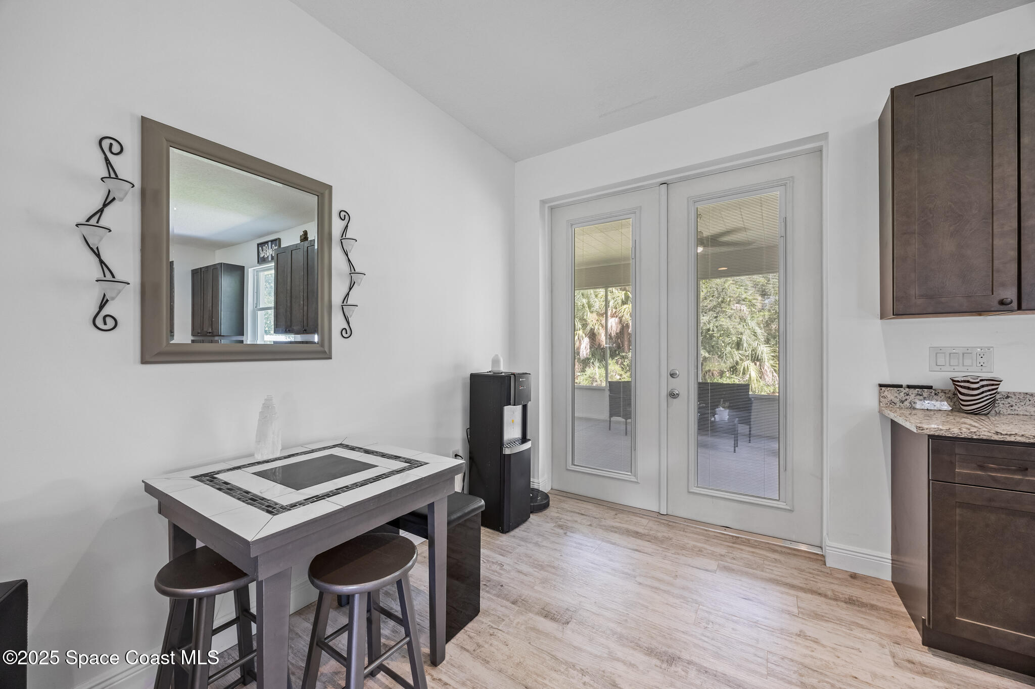 2050 Valkaria Road Grant-Valkaria, FL 32950 - Photo 11 of 56 a view of a workspace with furniture