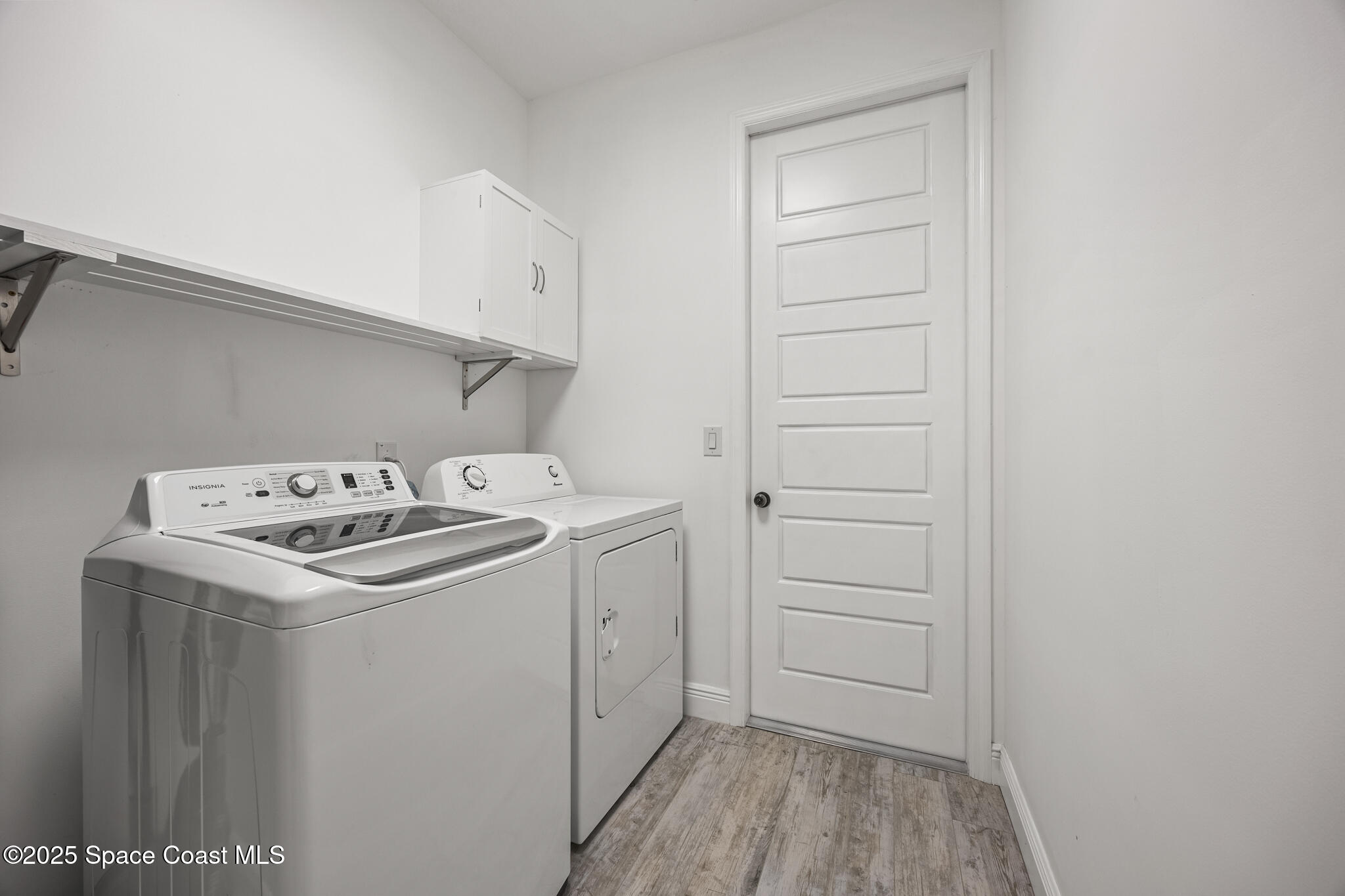 2050 Valkaria Road Grant-Valkaria, FL 32950 - Photo 28 of 56 a utility room with dryer and washer