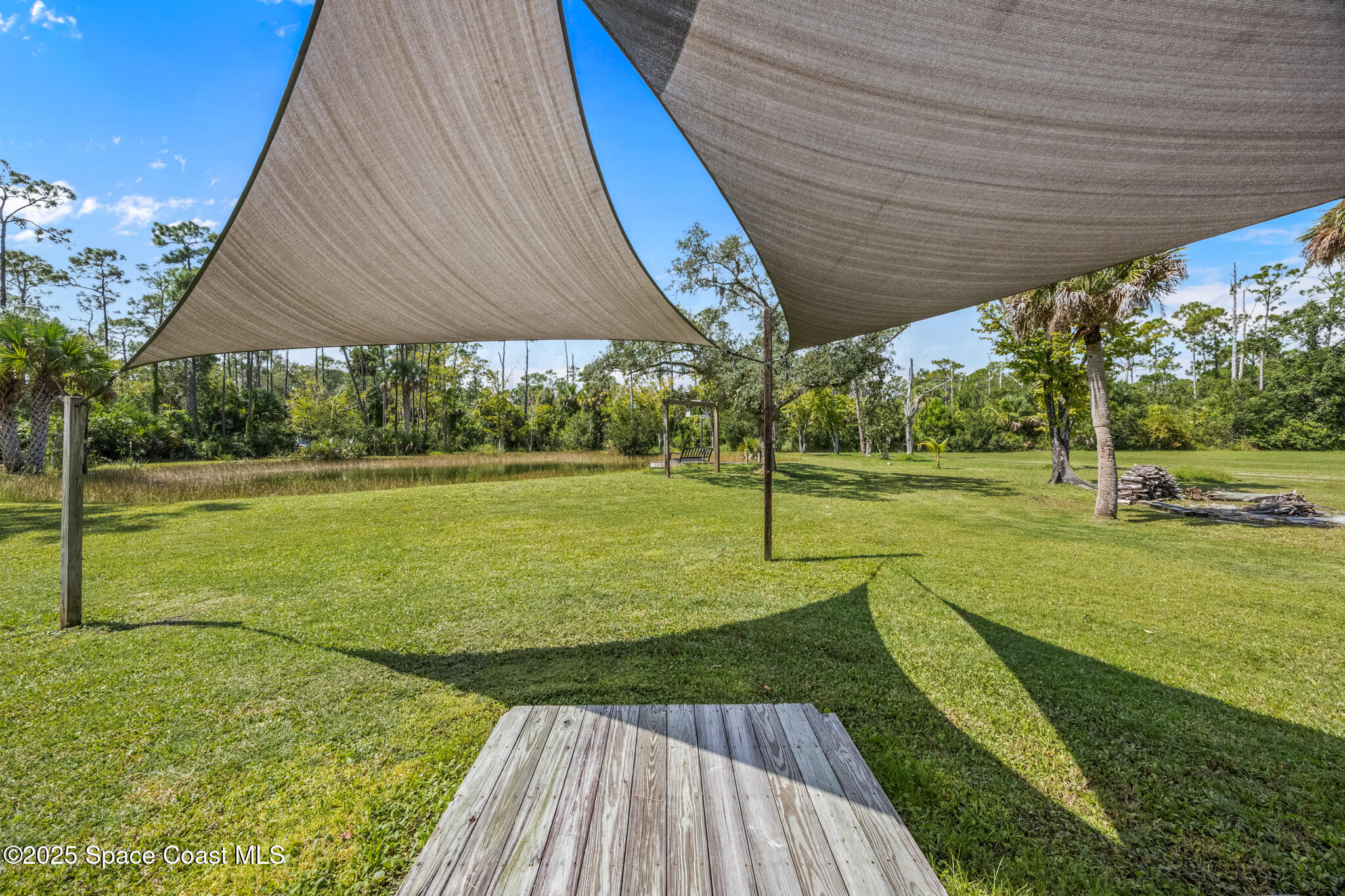 2050 Valkaria Road Grant-Valkaria, FL 32950 - Photo 38 of 56 a view of a park with a slide