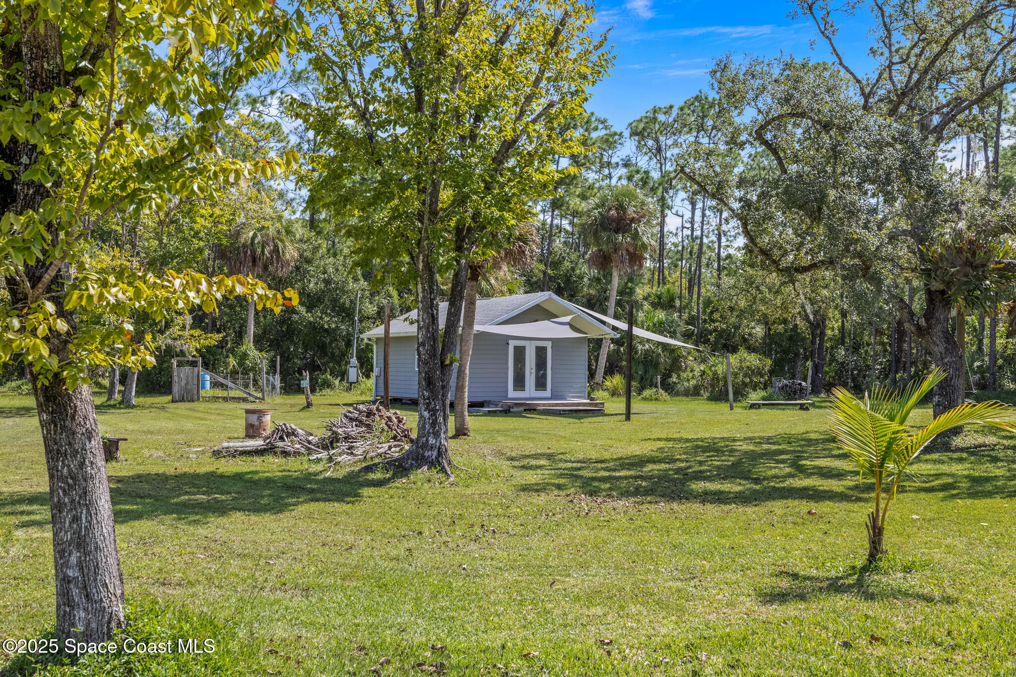 2050 Valkaria Road Grant-Valkaria, FL 32950 - Photo 41 of 56 a fire hydrant in the middle of a field