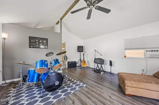 a workspace with furniture and wooden floor