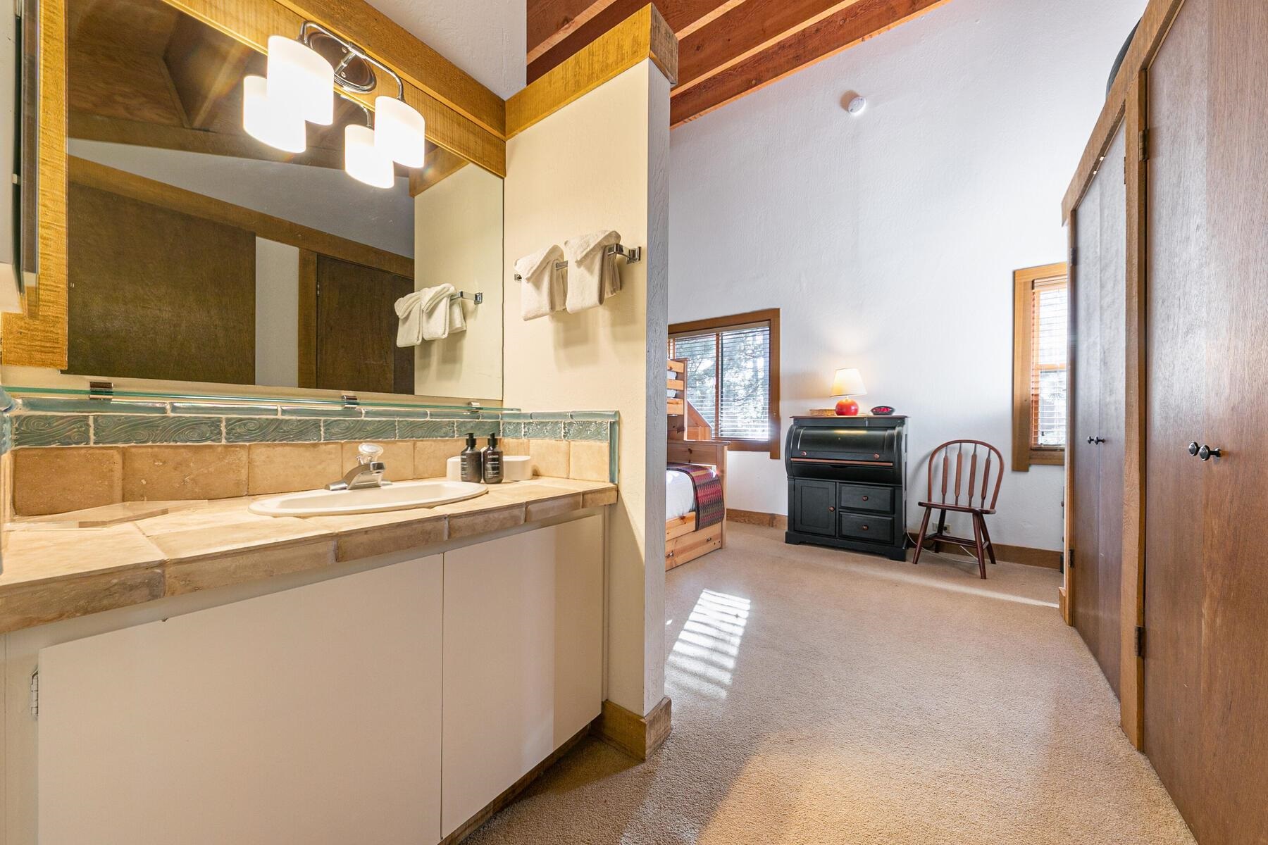 5096 Gold Bend Truckee, CA 96161 - Photo 15 of 27 a en suite bathroom with a sink and a mirror