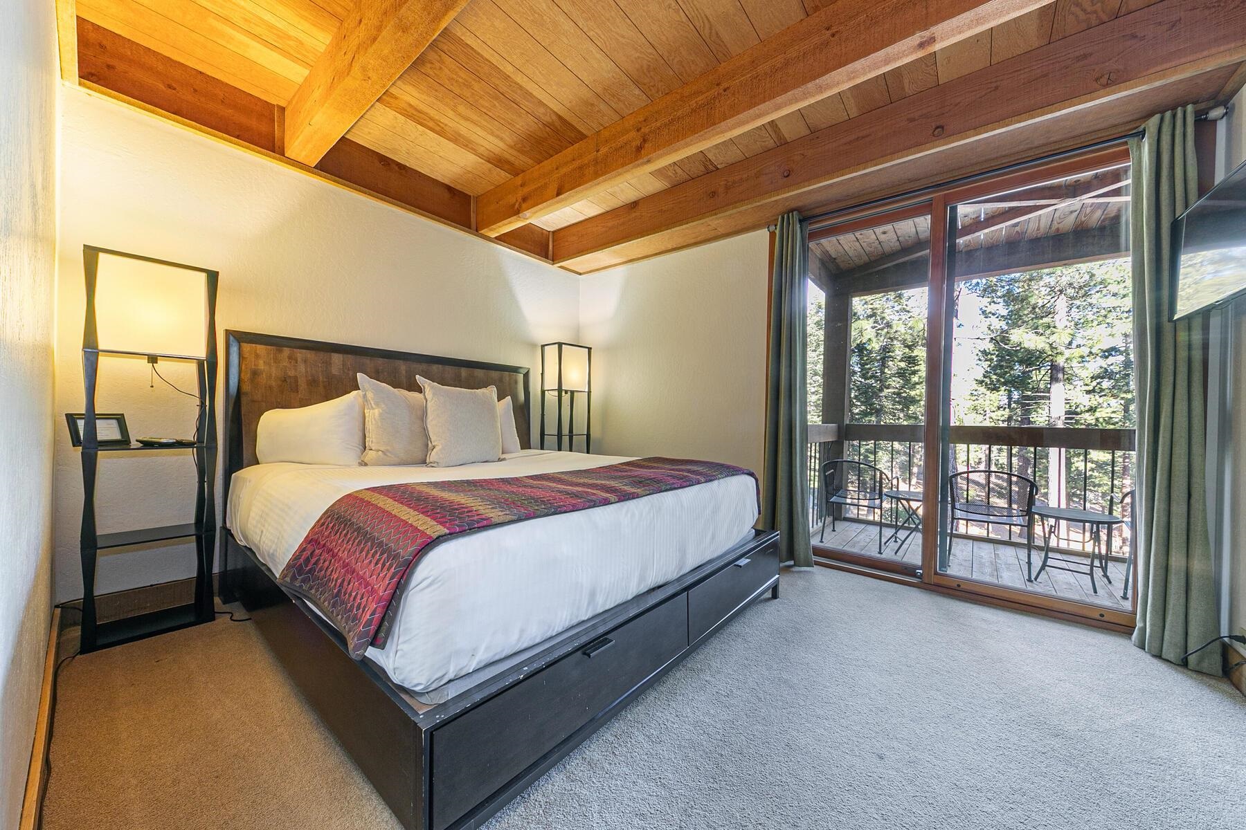 5096 Gold Bend Truckee, CA 96161 - Photo 10 of 27 a bed sitting in a spacious bedroom next to a window