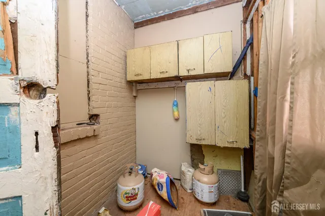 a view of an entryway with a kitchen