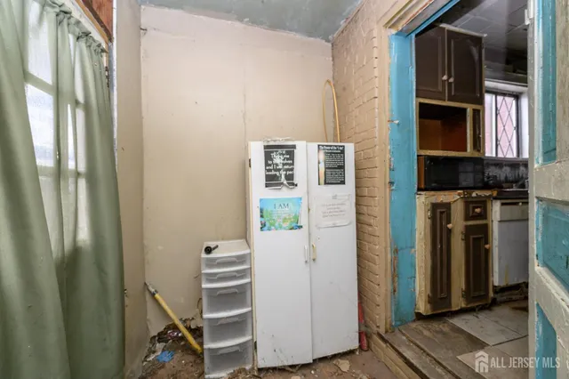 a bath room with a bath tub and a shower