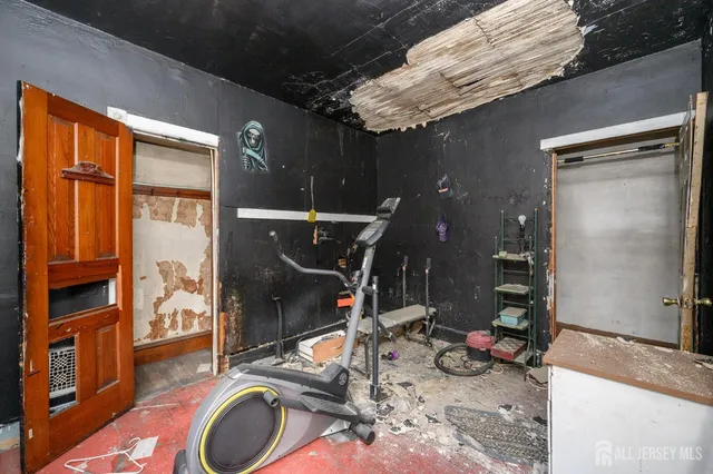 a bathroom with double vanity and a mirror
