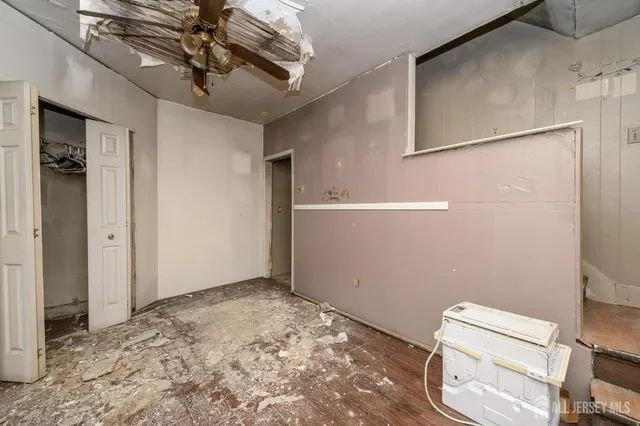 a view of a hallway with a chandelier