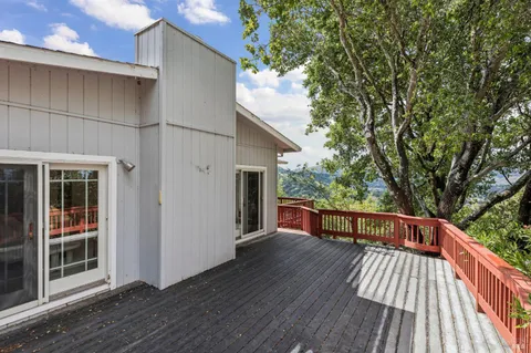 a view of a house with a deck