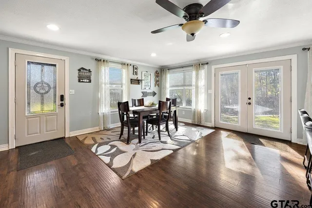 a view of a livingroom with furniture and a window
