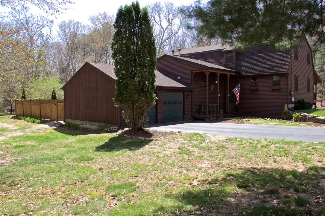 291 Widow Sweets Road Exeter, RI 02822 - Photo 1 of 27 Front of the house showing driveway and garage.