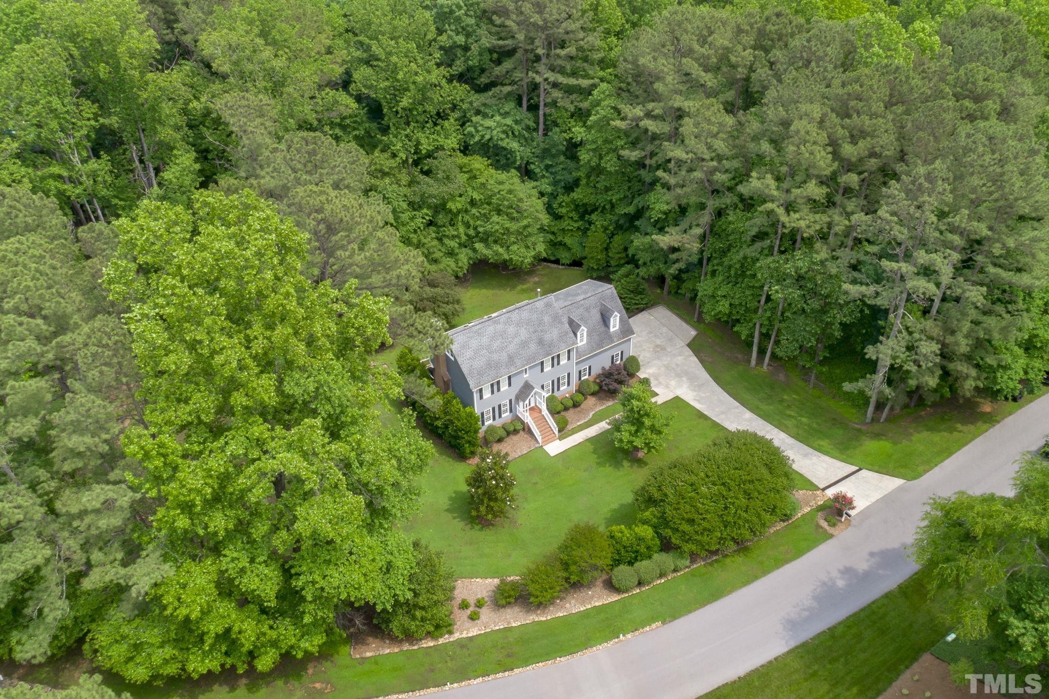 2821 Patrie Place Raleigh, NC 27613 - Photo 56 of 62 an aerial view of a house with a yard
