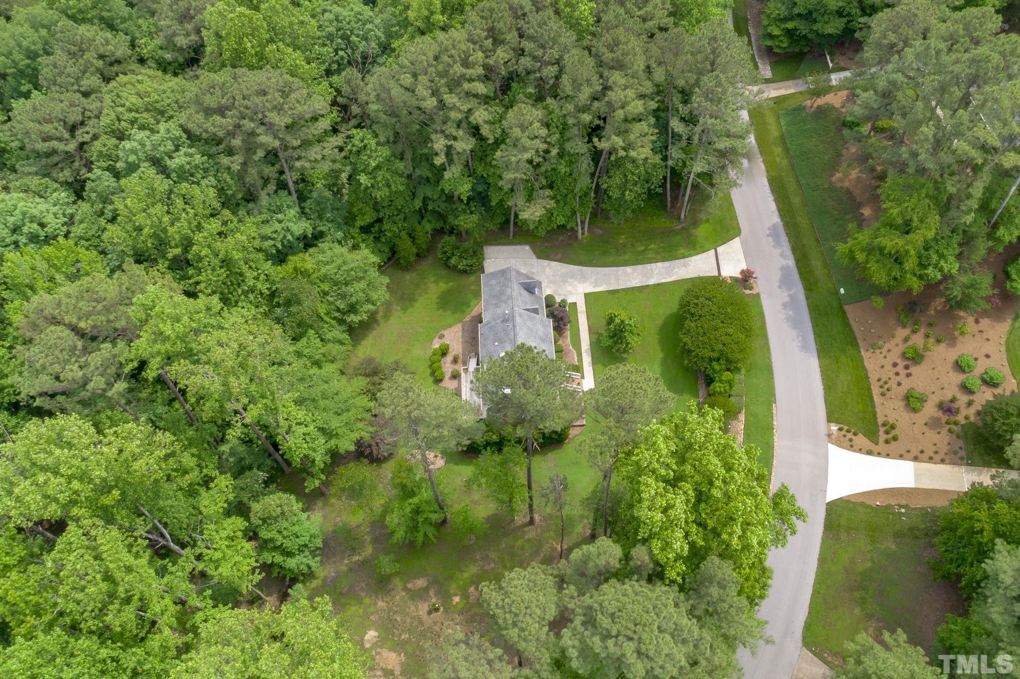 2821 Patrie Place Raleigh, NC 27613 - Photo 57 of 62 an aerial view of residential house with outdoor space and trees all around