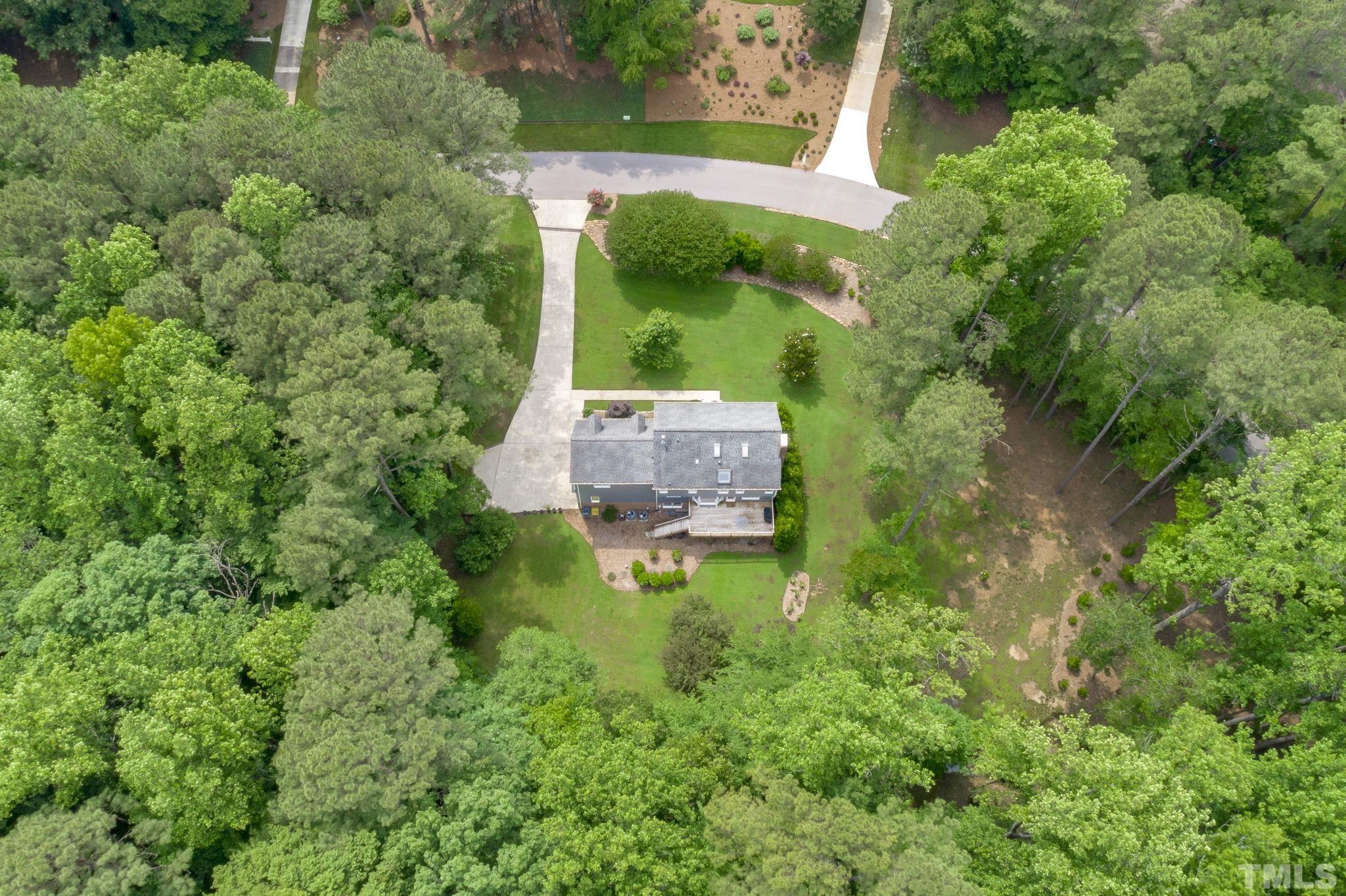 2821 Patrie Place Raleigh, NC 27613 - Photo 59 of 62 an aerial view of a house with pool outdoor seating and yard