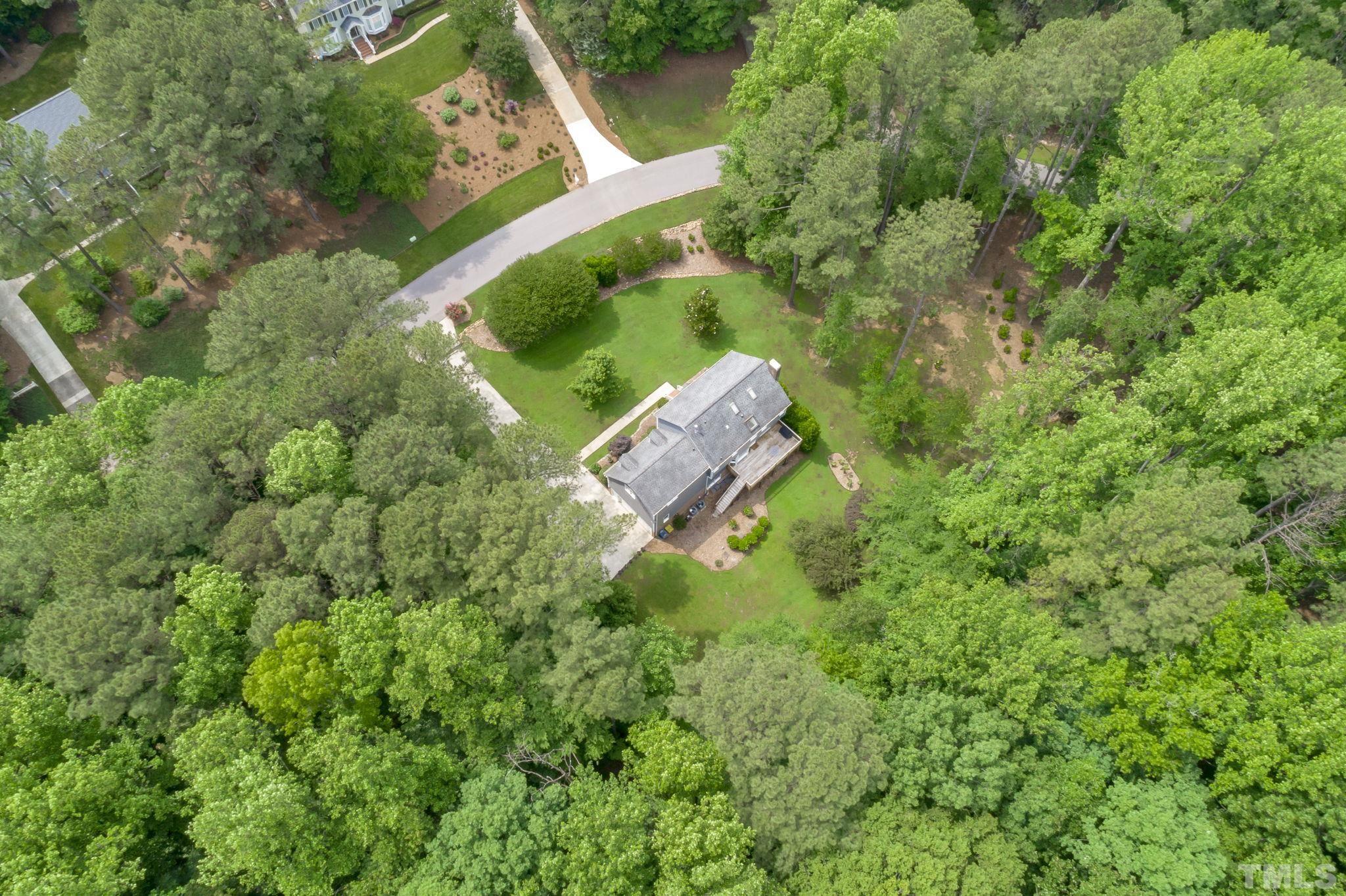 2821 Patrie Place Raleigh, NC 27613 - Photo 60 of 62 an aerial view of residential house with outdoor space and trees all around