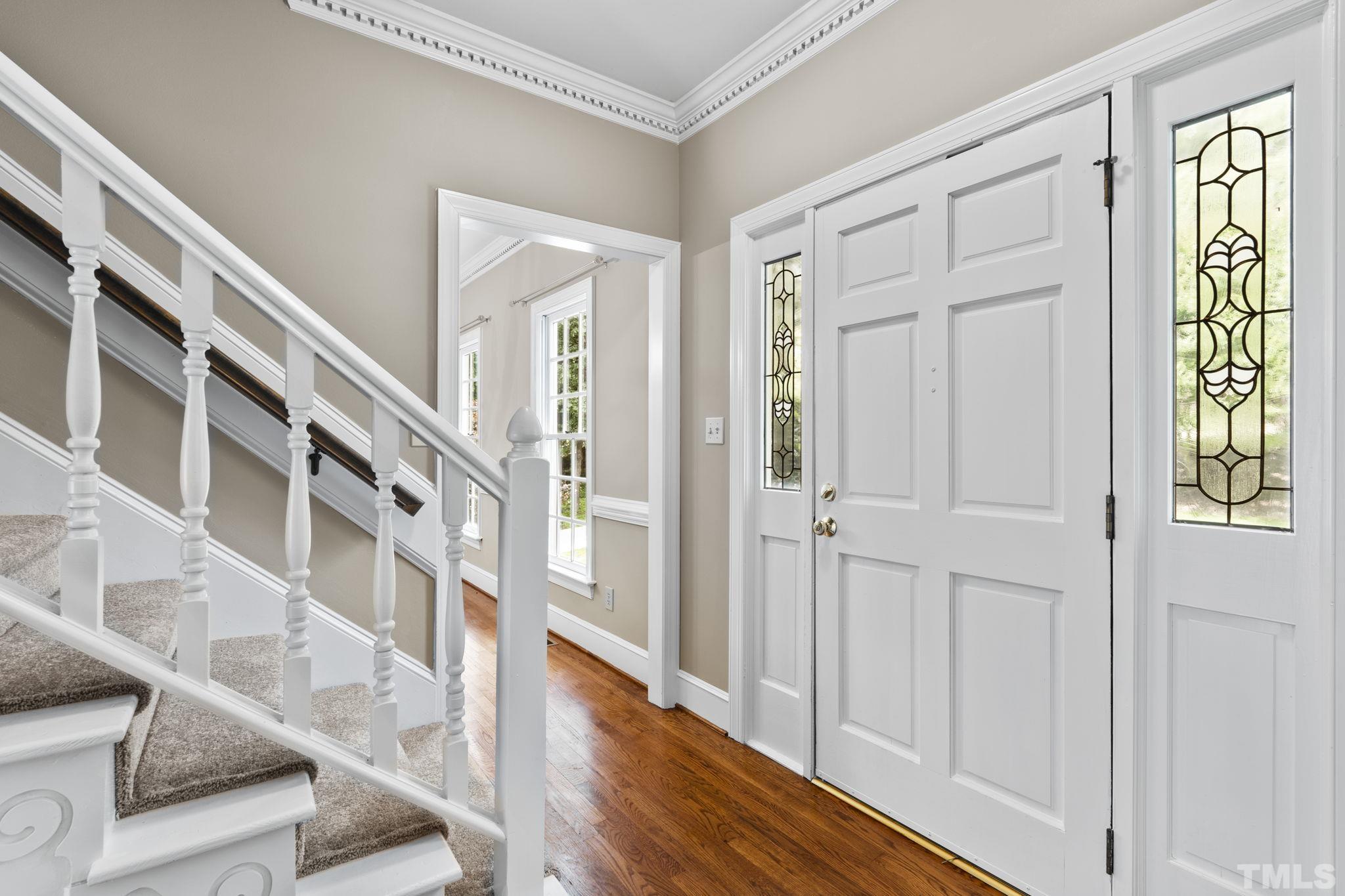 2821 Patrie Place Raleigh, NC 27613 - Photo 10 of 62 a view of an entryway with wooden floor