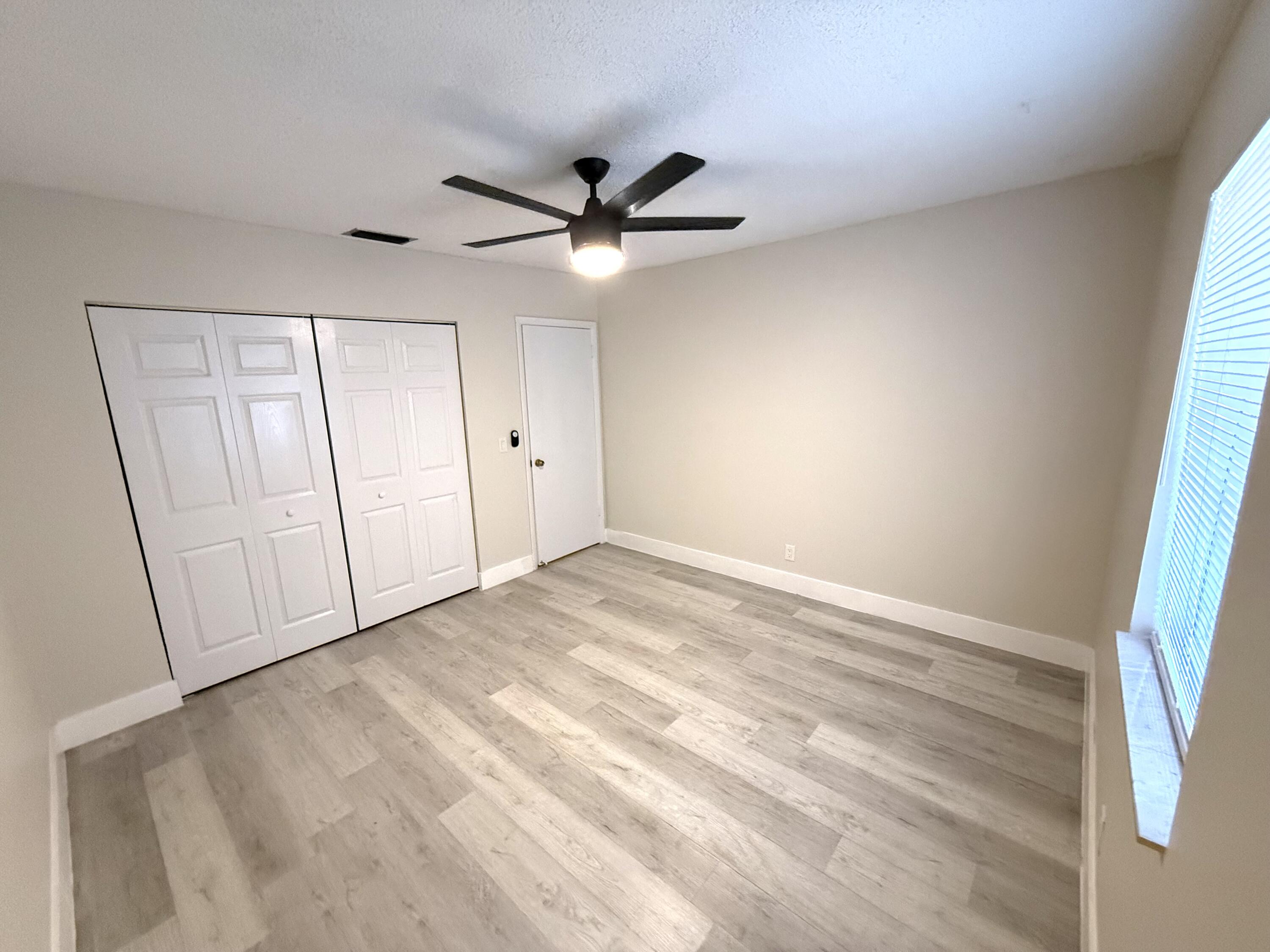 22324 Southwest 57th Circle Boca Raton, FL 33428 - Photo 11 of 22 a view of an empty room