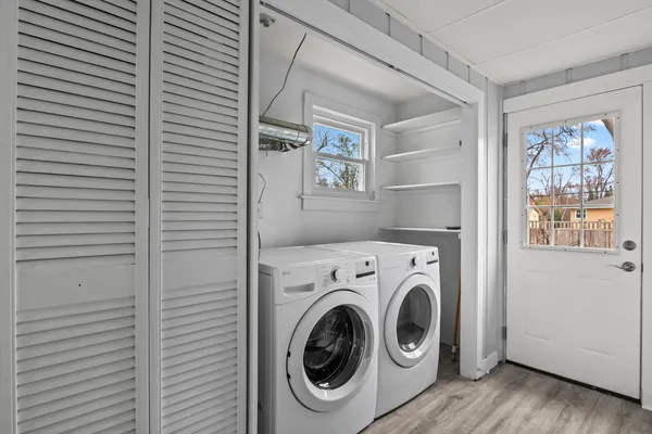 a utility room with dryer and washer