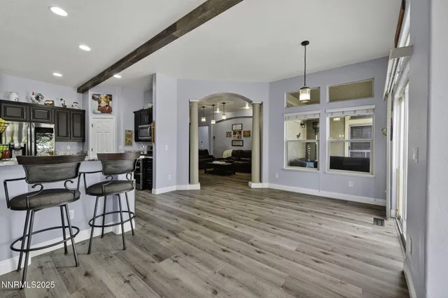 a kitchen with stainless steel appliances a stove and a refrigerator