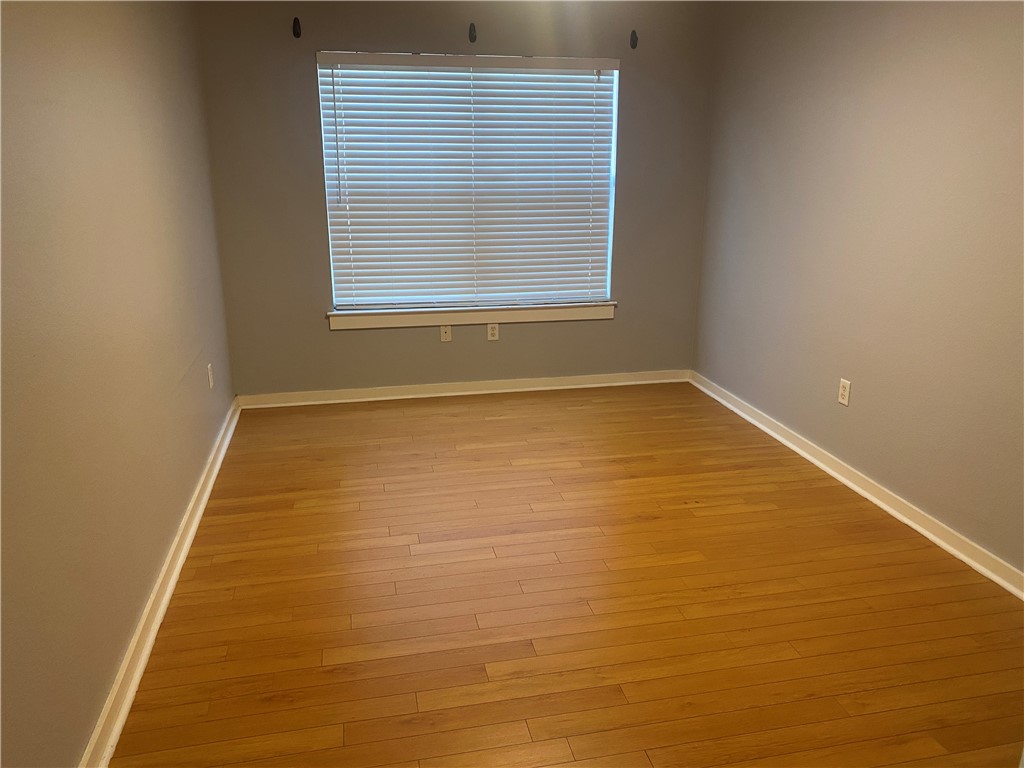 2106 Cullen Avenue, Unit 102 Austin, TX 78757 - Photo 9 of 11 a view of an empty room with window